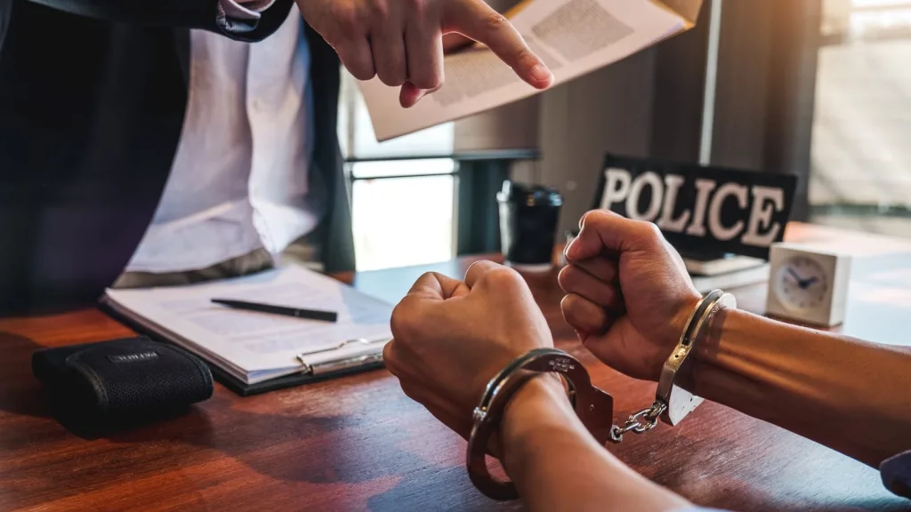 Photo of Man in Handcuffs